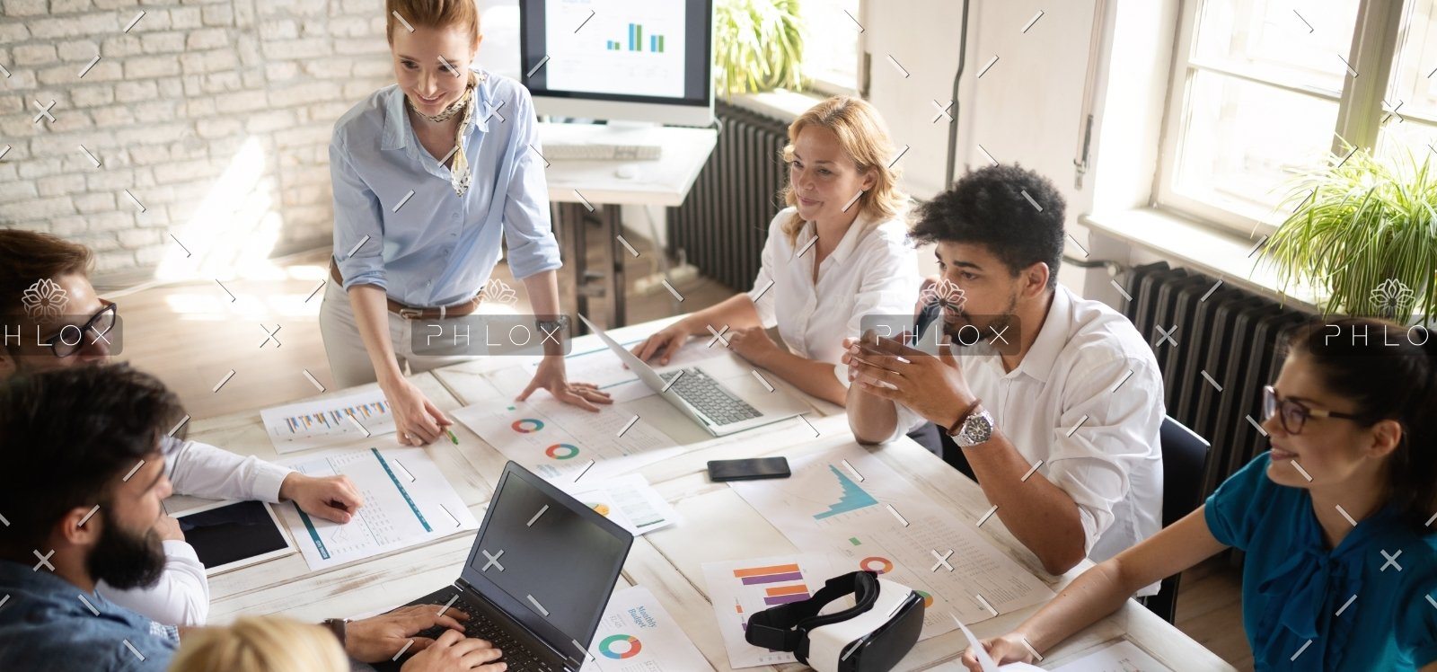 demo-attachment-933-happy-creative-team-in-office-business-startup-73ZC9YM